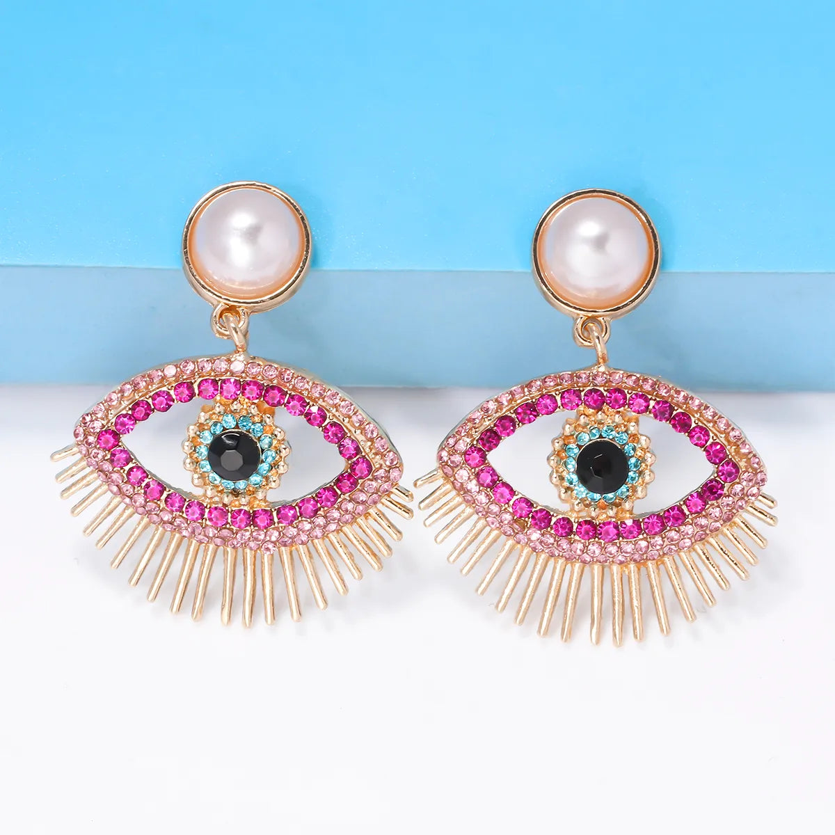 Streetwear Eye Imitation Pearl Alloy Plating Inlay Glass Stone Women'S Drop Earrings