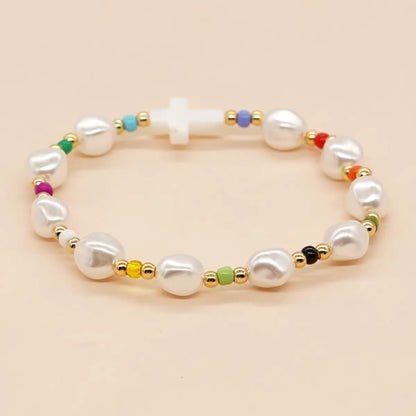 Sweet Cross Imitation Pearl Soft Clay Wholesale Bracelets