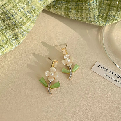 Sweet Flower Bow Knot Alloy Inlay Artificial Pearls Rhinestones Women'S Earrings