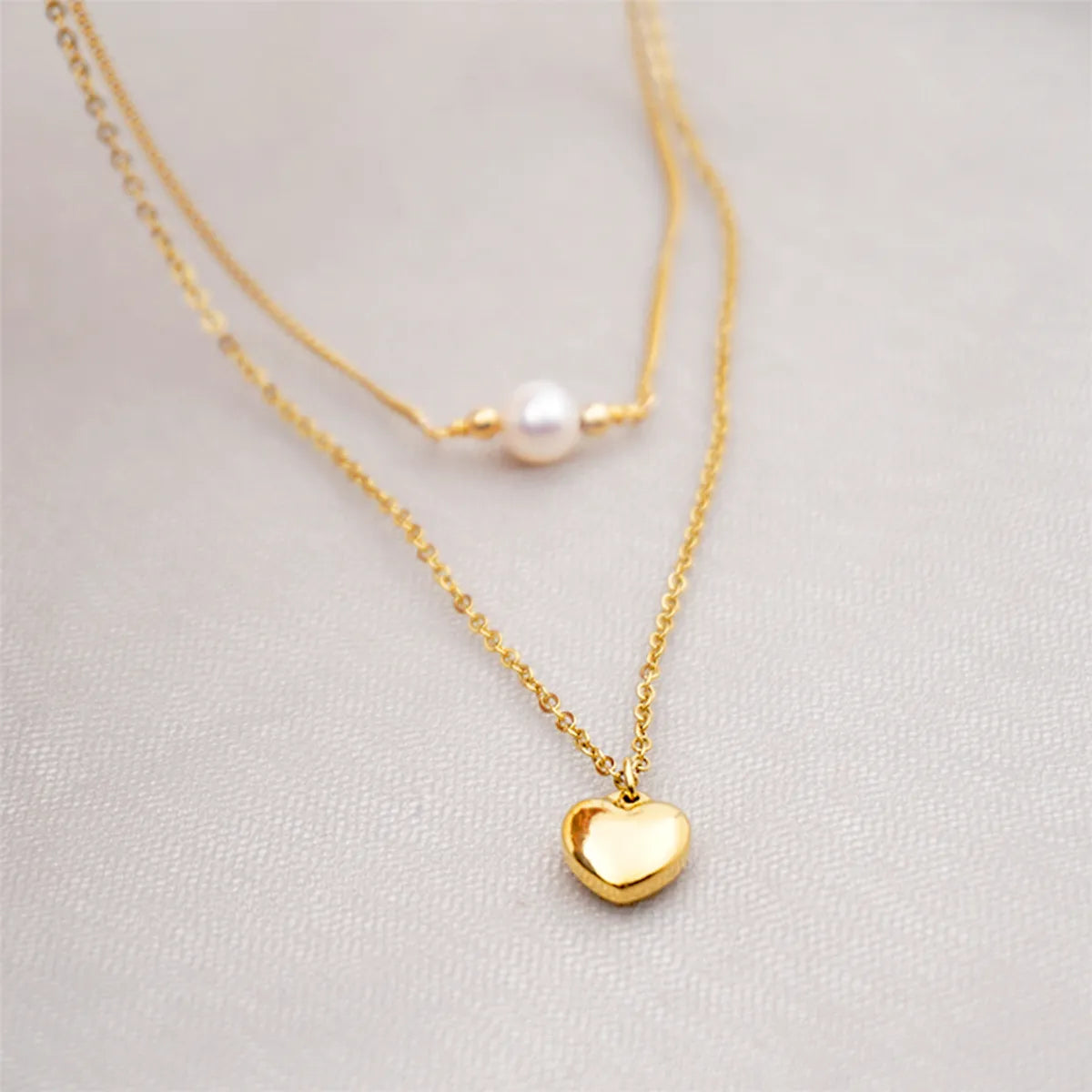 Titanium Steel Gold Plated Simple Style Heart Shape Inlay Artificial Pearls Double Layer Necklaces Sweater Chain