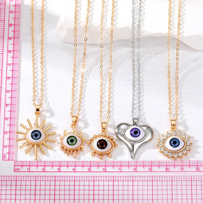 Vacation Funny Simple Style Sun Heart Shape Eye Alloy Inlay Rhinestones Women'S Pendant Necklace