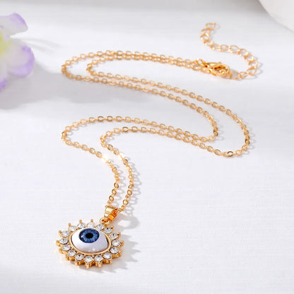 Vacation Funny Simple Style Sun Heart Shape Eye Alloy Inlay Rhinestones Women'S Pendant Necklace