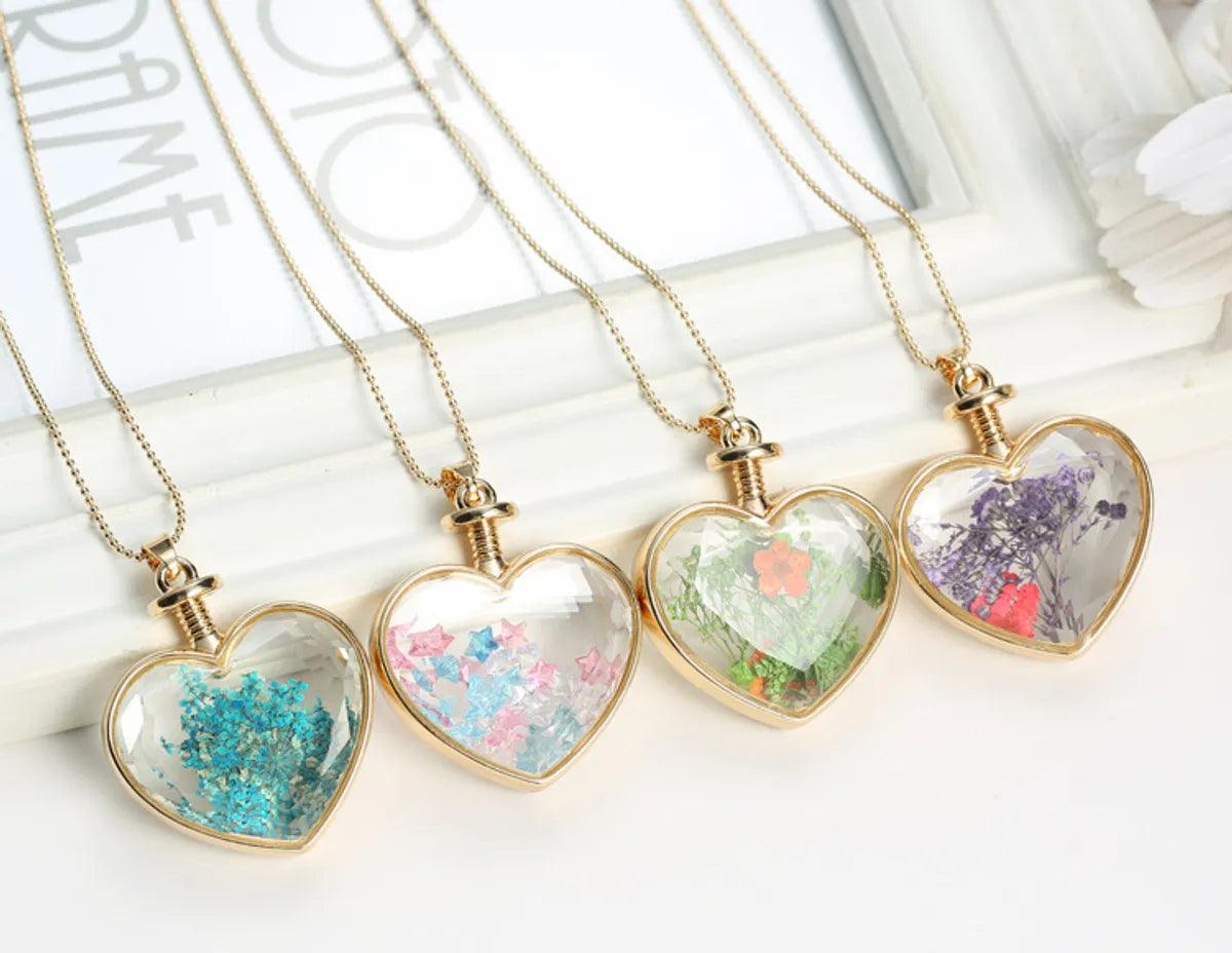 Vacation Heart Shape Alloy Dried Flower Glass Wholesale Pendant Necklace