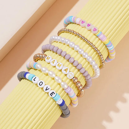 Vacation Multicolor Letter Plaid Gold Plated Imitation Pearl Soft Clay Wholesale Bracelets