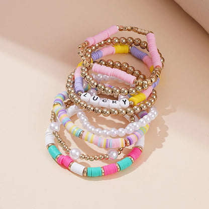 Vacation Multicolor Letter Plaid Gold Plated Imitation Pearl Soft Clay Wholesale Bracelets