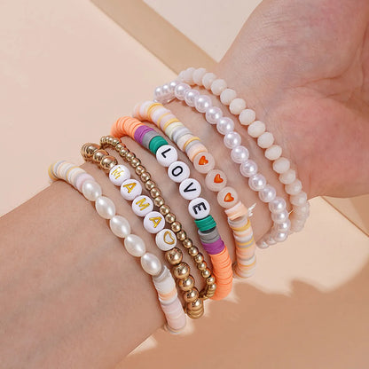 Vacation Multicolor Letter Plaid Gold Plated Imitation Pearl Soft Clay Wholesale Bracelets