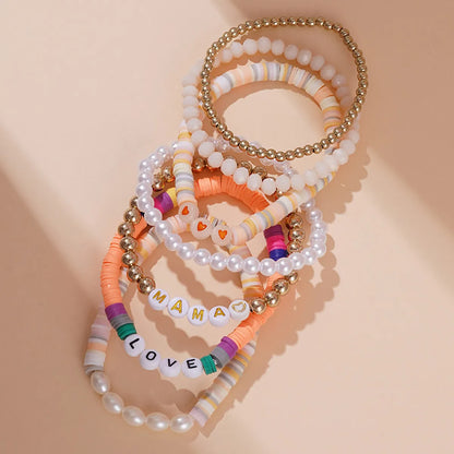 Vacation Multicolor Letter Plaid Gold Plated Imitation Pearl Soft Clay Wholesale Bracelets