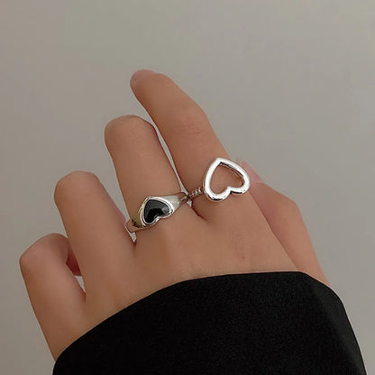 Vintage Black Heart-shaped Hollowed Dripping Oil Alloy Ring Two-piece Set Wholesale