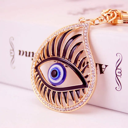 Vintage Style Devil'S Eye Zinc Alloy Plating Inlay Rhinestones Women'S Bag Pendant Keychain