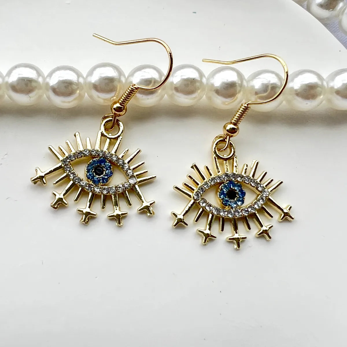 Vintage Style Shiny Devil'S Eye Alloy Plating Inlay Zircon Gold Plated Women'S Drop Earrings