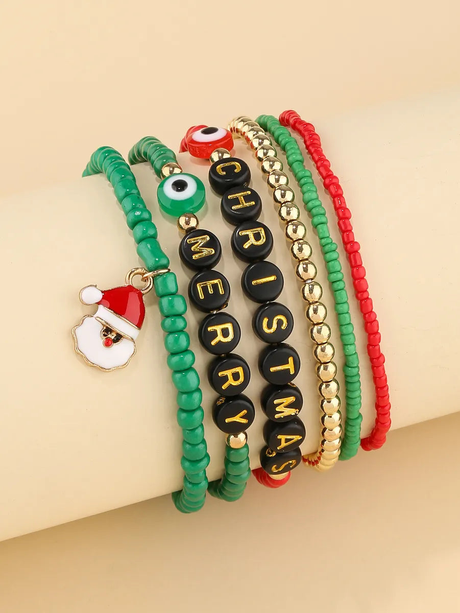 Vintage Style Simple Style Santa Claus Letter Devil's Eye Arylic Soft Clay Irregular Beaded Unisex Bracelets