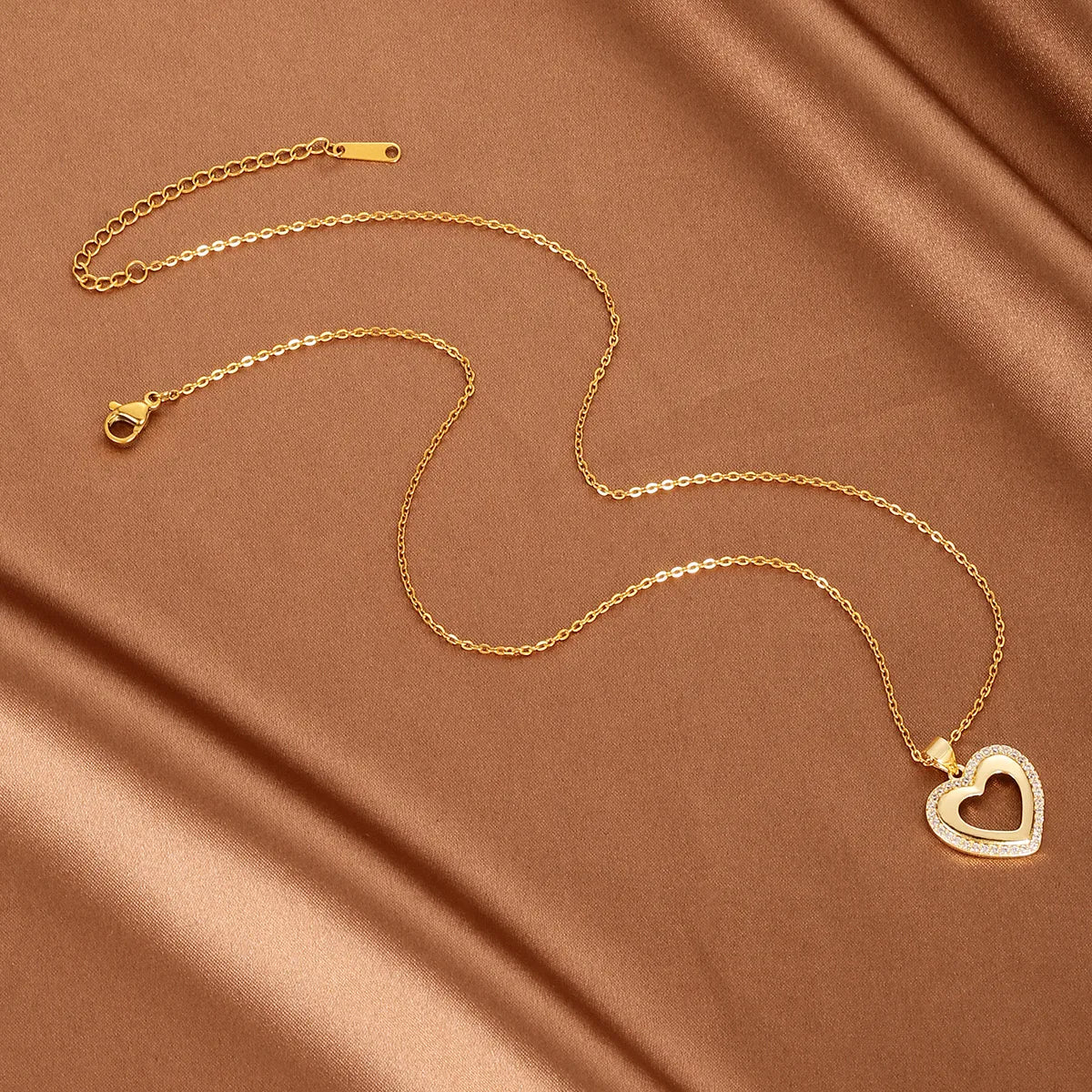 Wholesale Basic Modern Style Classic Style Heart Shape Copper Hollow Out Inlay 18K Gold Plated Zircon Pendant Necklace