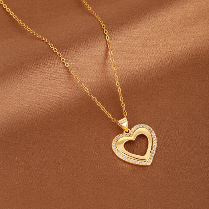 Wholesale Basic Modern Style Classic Style Heart Shape Copper Hollow Out Inlay 18K Gold Plated Zircon Pendant Necklace