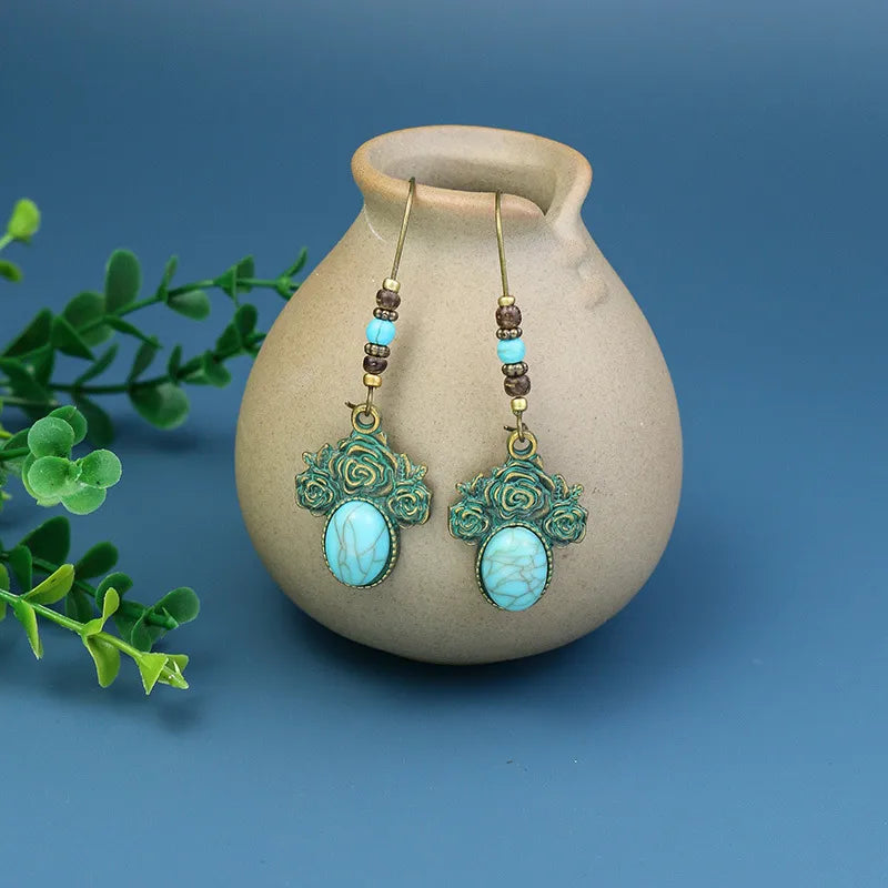 Wholesale Jewelry 1 Pair Bohemian Leaf Round Sun Alloy Turquoise Drop Earrings