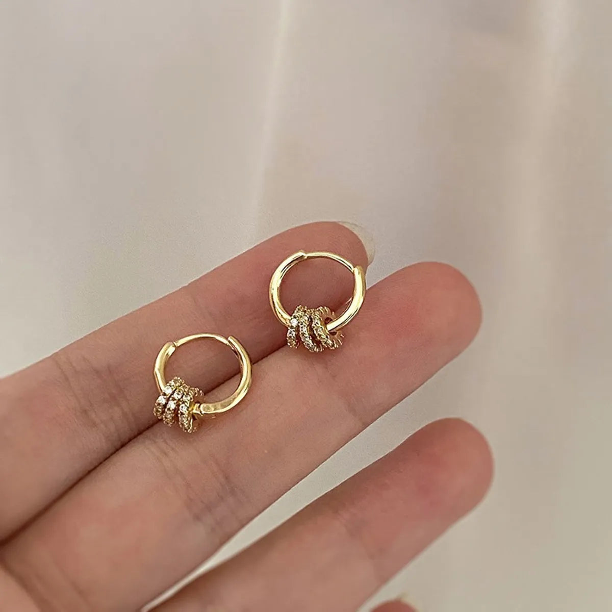 Wholesale Jewelry 1 Pair Simple Style Heart Shape Solid Color Twist Metal Zircon Earrings Ear Studs