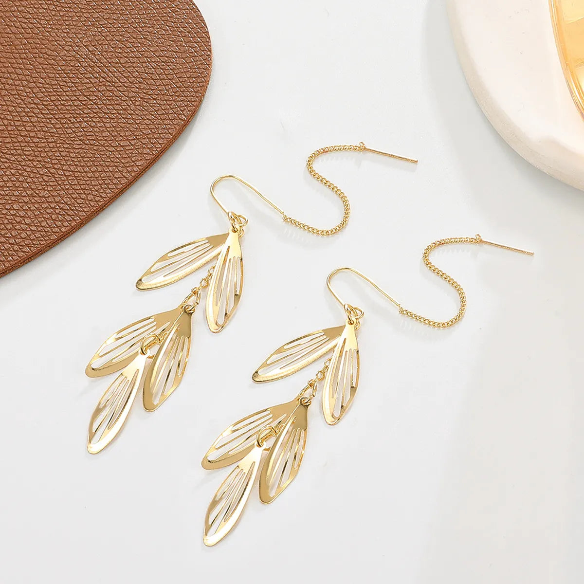 Wholesale Jewelry 1 Pair Simple Style Leaves Alloy 14k Gold Plated Dangling Earrings