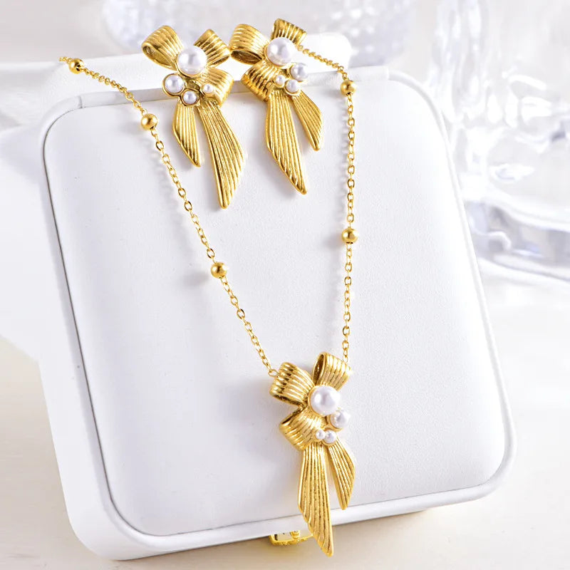 Wholesale Jewelry IG Style Bow Knot Titanium Steel Pearl Inlay Earrings Necklace