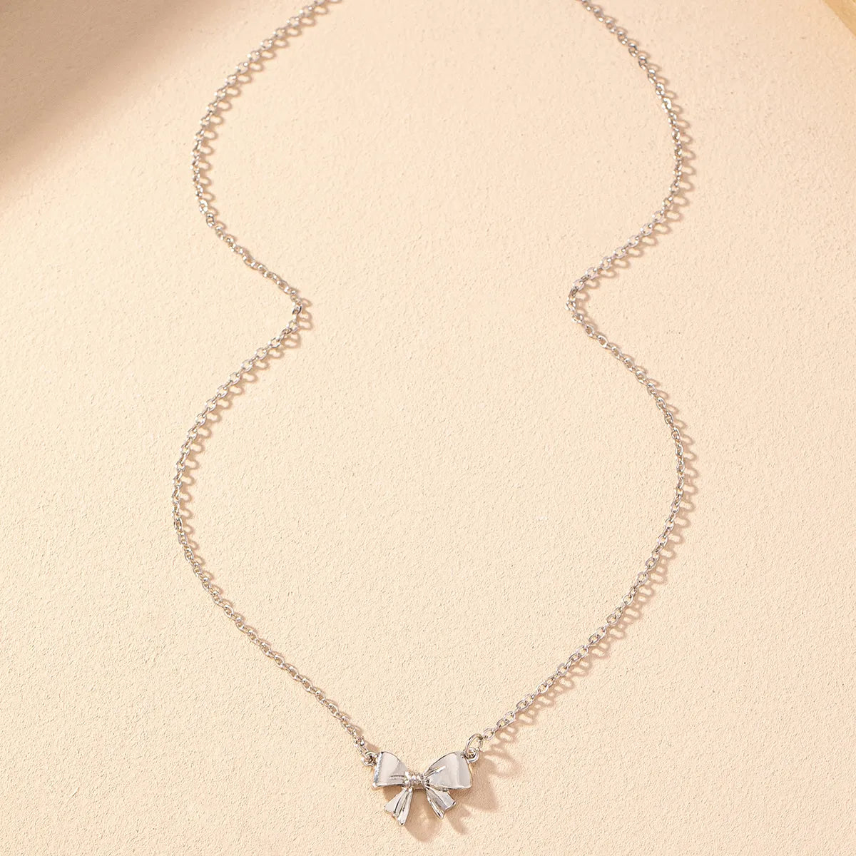 Wholesale Jewelry Simple Style Classic Style Bow Knot Iron Zinc Alloy Pendant Necklace