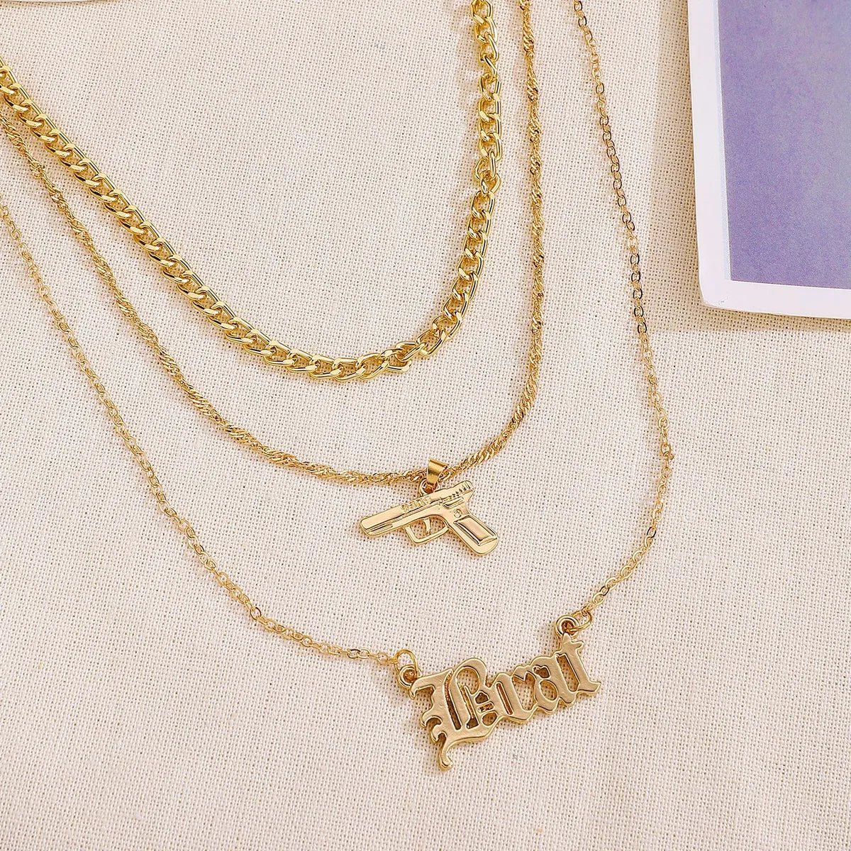 Wholesale Jewelry Simple Style Classic Style Letter Pistol Alloy Layered Necklaces