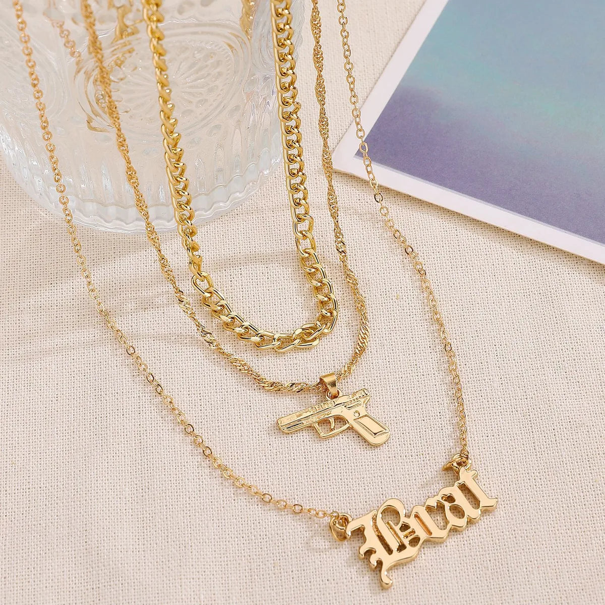 Wholesale Jewelry Simple Style Classic Style Letter Pistol Alloy Layered Necklaces