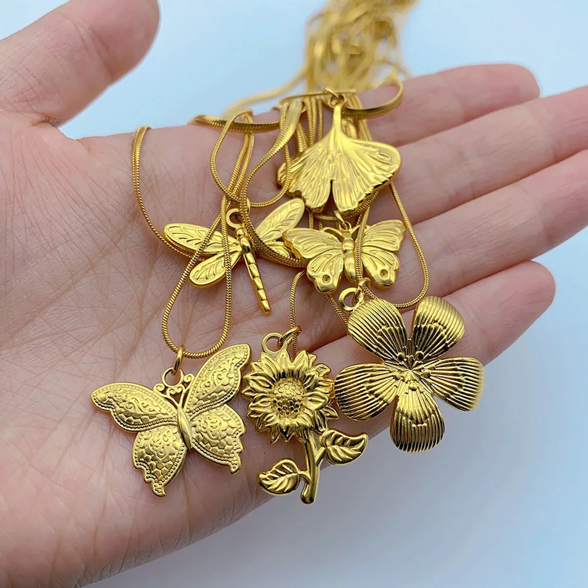 Wholesale Simple Style Flower Butterfly Ginkgo Leaf Titanium Steel Layered Necklaces