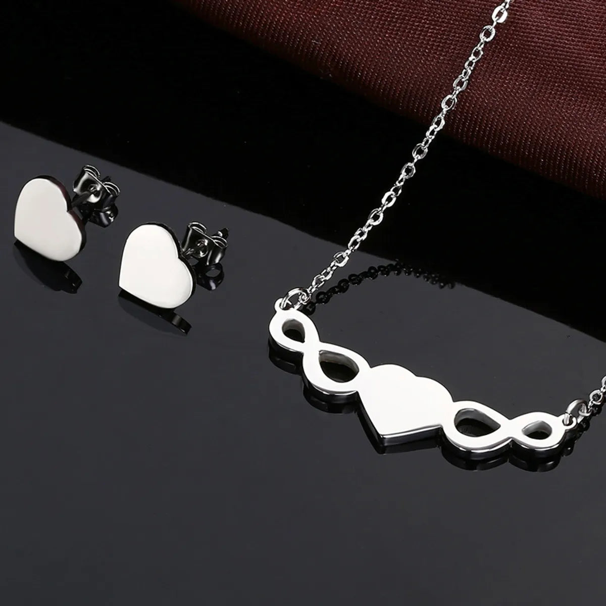 Wholesale Simple Style Infinity Heart Shape Titanium Steel Plating Hollow Out Earrings Necklace