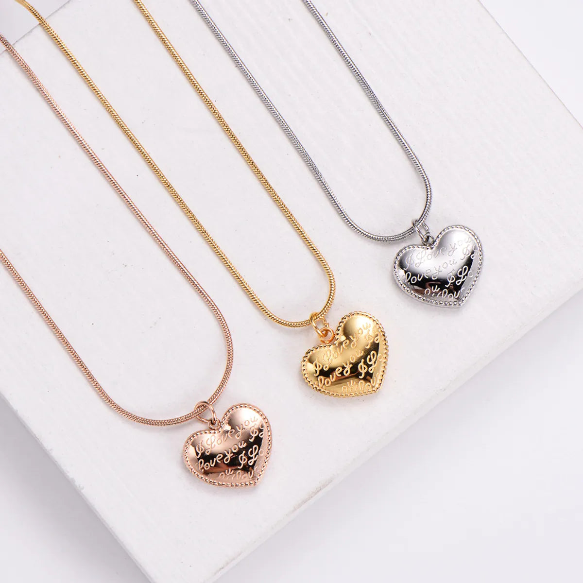 Women's Simple Style Heart Shape Stainless Steel No Inlaid Pendant Necklace Carving Stainless Steel Necklaces