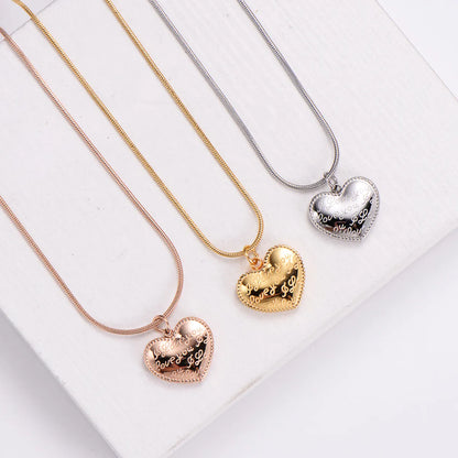 Women's Simple Style Heart Shape Stainless Steel No Inlaid Pendant Necklace Carving Stainless Steel Necklaces