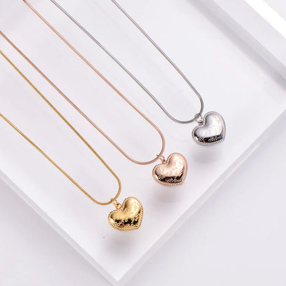 Women's Simple Style Heart Shape Stainless Steel No Inlaid Pendant Necklace Carving Stainless Steel Necklaces