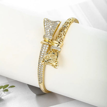 Xuping Shiny Bow Knot Alloy Plating Inlay Artificial Gemstones 14k Gold Plated Women'S Bangle