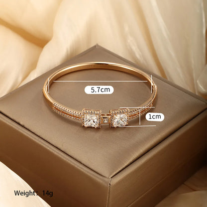 Xuping Simple Style Solid Color Alloy Plating Inlay Artificial Gemstones 18k Gold Plated Women'S Bangle